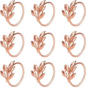 Set of 9 elegant rose gold leaf-shaped napkin rings for wedding table decor