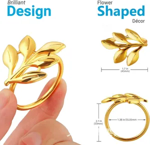 Detail view of gold leaf napkin rings with size measurements for wedding decor.