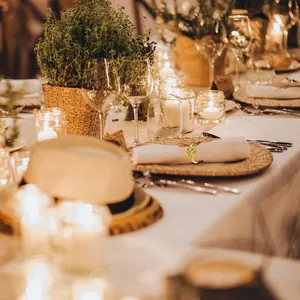 Elegant gold leaf napkin ring showcased in a romantic wedding dinner table setting