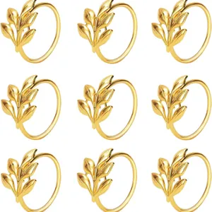 9-piece set of elegant golden leaf napkin rings for wedding and hotel table settings