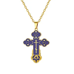 Close-up of golden stainless steel Orthodox cross pendant with purple enamel detail