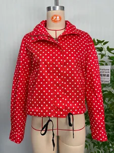 Red women's lightweight jacket with classic white polka dot print and stand collar