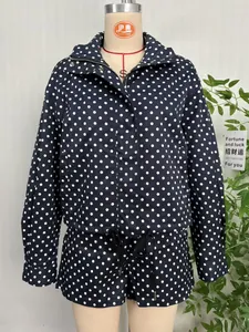 Full view of polka dot jacket and matching shorts set on a mannequin
