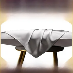 Luxurious silver grey faux silk pillow towel draped on stool detail