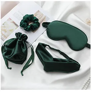 Dark green faux silk sleep mask set including eye mask, scrunchie and drawstring pouch