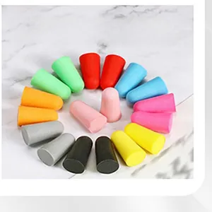 Detailed macro shot showing various colors of soft foam earplugs for noise reduction