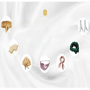 Collection of satin sleep accessories including eye mask, pillowcase, and silk scrunchies.