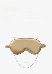 Detailed view of champagne silk eye mask with ergonomic face contour fit