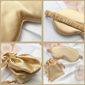 Luxurious champagne gold silk-like sleep mask set with matching drawstring storage pouch