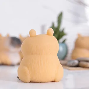 Adorable beige capybara squishy toy shown from the back with slow rebound texture