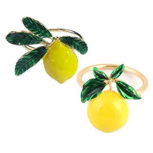 Ensemble de ronds de serviette citron décoratifs avec émail jaune et feuilles vertes