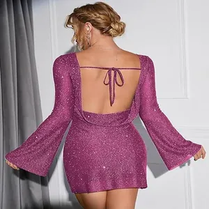 Detailed back view of a sparkling purple backless mini dress with elegant long bell sleeves.