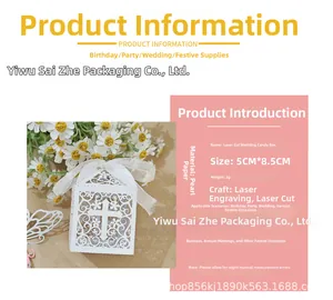 Detail view of white hollow-out cross candy box with ribbon for wedding and party favors