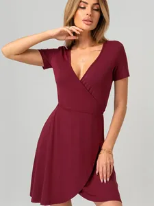 Elegant burgundy maternity wrap dress featuring a deep V-neck cross design and short sleeves.