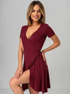 Elegant burgundy V-neck wrap dress with short sleeves and a stylish high side slit