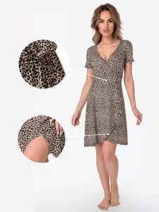 Detail view of a leopard print V-neck maternity wrap dress showing fabric texture