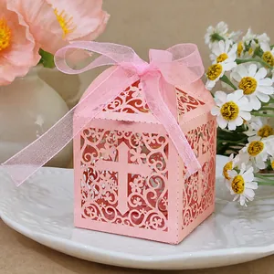Elegant pink laser-cut cross candy box with ribbon for wedding and baptism party