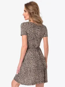 Back view of leopard print maternity dress with short sleeves and a slim fit design.