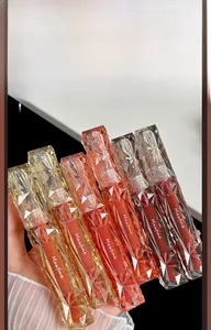 Maxfine mirror lip glazes showing multiple shades in crystal faceted packaging