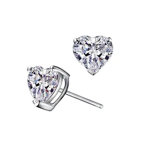 Detailed view of elegant heart-shaped moissanite stud earrings with brilliant diamond-like sparkle