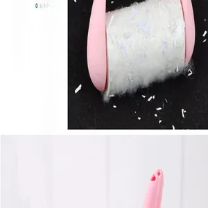 Macro detail of pink lint roller showing adhesive sheet texture and hair removal effect.