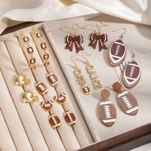 Detailed view of stylish football-themed earrings set in a premium velvet jewelry box
