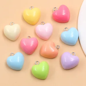 Colorful 17x18mm heart-shaped resin charms for DIY jewelry making and bag pendants.