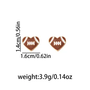 Detailed view of heart-shaped football enamel stud earrings with 1.4cm by 1.6cm dimensions