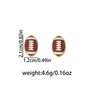 Detailed macro view of brown enamel football stud earrings with size and weight specs