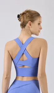Detailed macro shot of lilac sports bra showing criss-cross back and double-layered V design