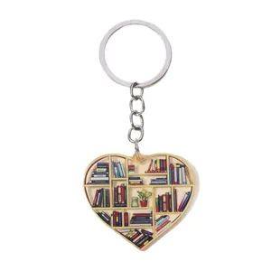 Heart-shaped bookshelf keychain with colorful book illustration design