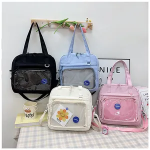 Cute student handbags in four colors with transparent front pocket display window
