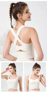 Viste dettagliate del reggiseno sportivo avorio da donna con design a incrocio