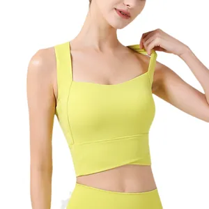 Reggiseno sportivo verde lime da donna con spalline larghe e dettaglio incrociato sul fondo