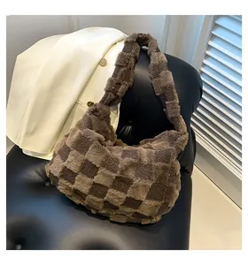 Detailed macro view of a plush checkered hobo tote bag in an autumn lifestyle scene