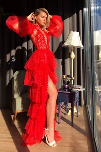 Elegant red lace tiered mesh prom dress with puffy long sleeves and high slit.