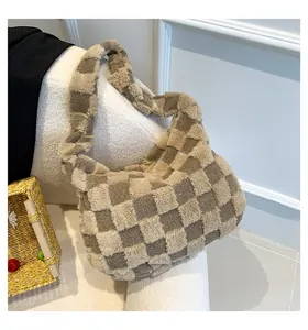 Detailed view of the stylish checkered plush tote bag showing its soft fuzzy texture