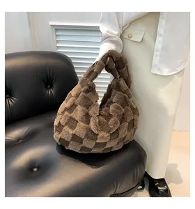Detailed view of a stylish large capacity brown plush checkerboard tote bag for winter