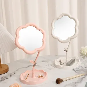 Elegant tabletop flower-shaped makeup mirrors in pink and white with rotatable stand