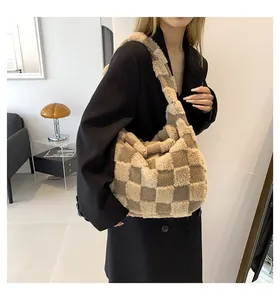 Large capacity plush checkerboard shoulder bag for women shown in a casual indoor setting