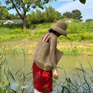Vintage raffia straw fisherman hat and tote bag for summer sun protection outdoors