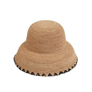 Hepburn style fine Raffia straw bucket hat for women with black wave trim sun protection
