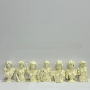 Detailed view of seven spoof goddess statues making a middle finger gesture in ivory resin