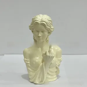 Detailed view of Vienna Goddess resin statue making a funny middle finger gesture