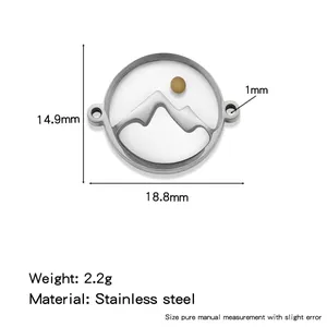 Detail view of mountain and sun stainless steel pendant with dimensions and weight specs