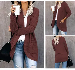Women's burgundy waffle knit cardigan with curved hem and pockets shown from multiple angles
