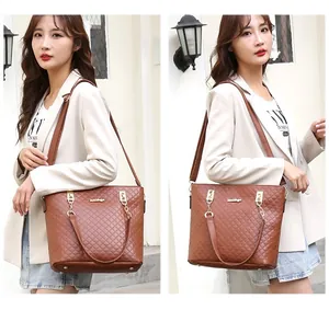 Stylish brown quilted tote bag for women shown on a model in a lifestyle setting