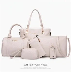 Detail of the 6-piece quilted handbag set in off-white with golden hardware
