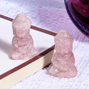 Handgeschnitzte Baby-Buddha-Figuren aus natürlichem Rosenquarz für Büro und Heim.