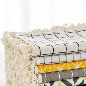 Mantel moderno de lino con estampado geométrico de cuadros y borlas decorativas